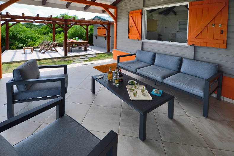 La petite maison martinique Sur la terrasse, bercé par les Alizés