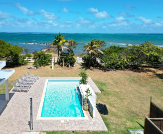 Location villa de luxe les pieds dans l'eau Martinique tropical sun océan