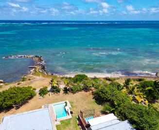 Location villa de luxe pieds dans l'eau Martinique tropical sun océan