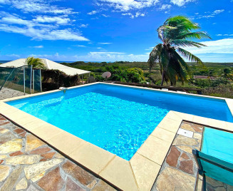 Maison piscine vue mer Sainte Anne Haut Nymphea