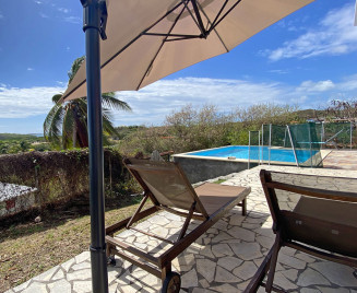 location piscine vue mer Sainte Anne Haut Nymphea