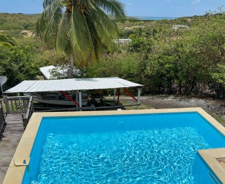 location piscine vue mer Sainte Anne Haut Nymphea