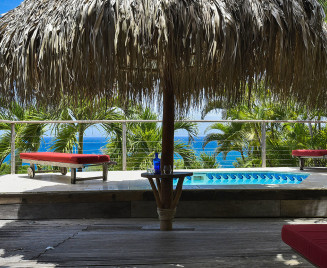 Location Martinique vue turquoise Parassol Tartane